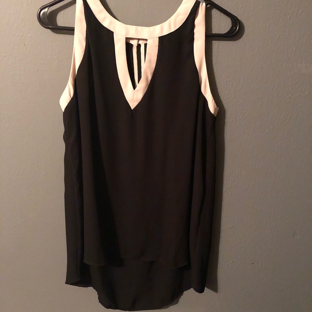 Sleeveless cut out blouse